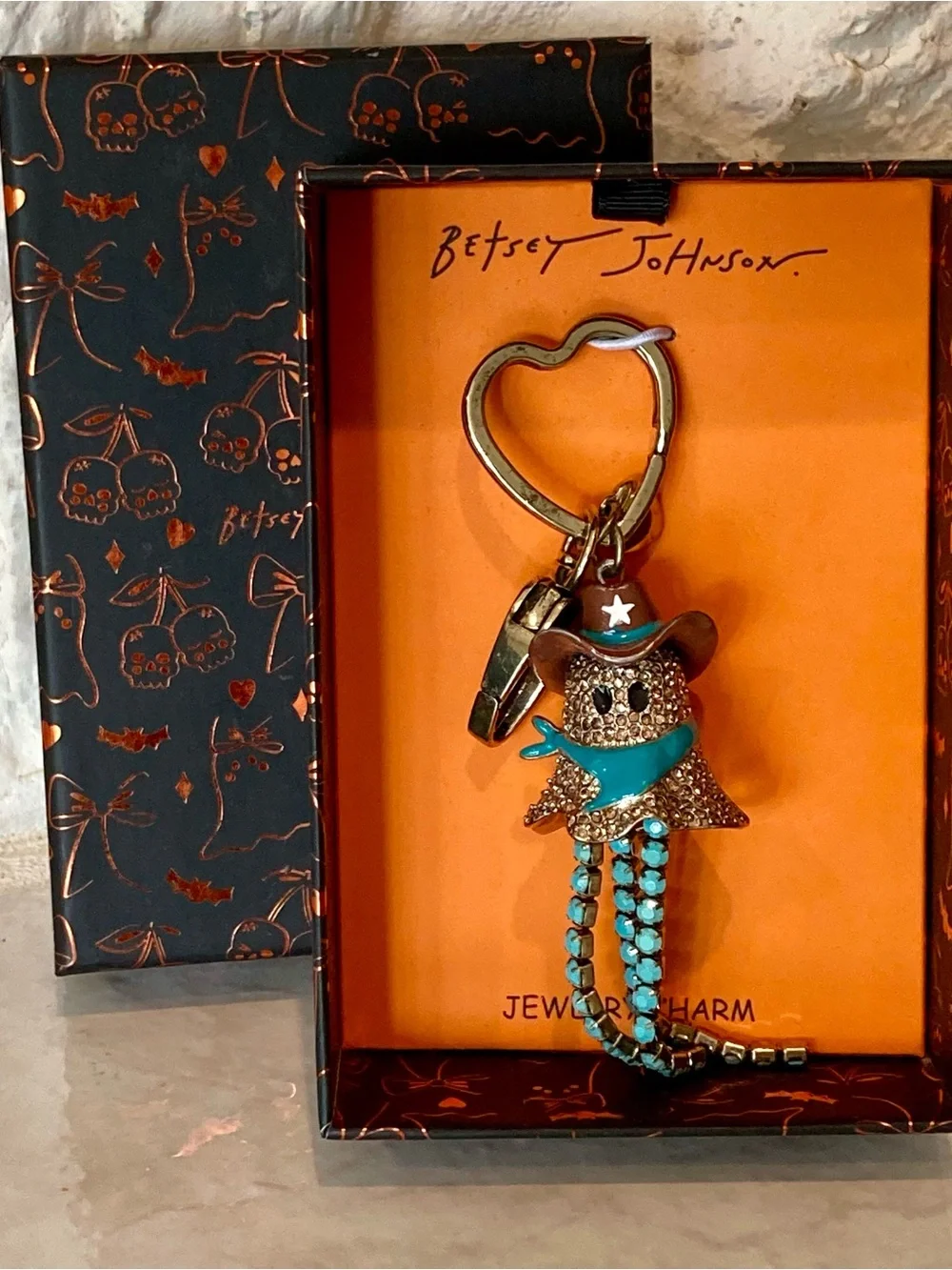 NWT and box Betsey Johnson spooky sheriff cowboy ghost bag charm and keychain.